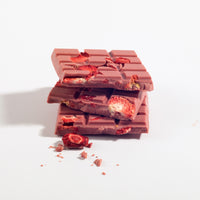 Charles Chocolates Ruby Garnet Strawberry Bar, broken pieces stacked
