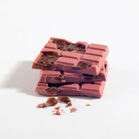 Charles Chocolates Ruby Garnet Cocoa Nib Brittle Bar, broken pieces stacked