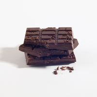 Charles Chocolates Caramelized Cocoa Nib Bar, broken pieces stacked