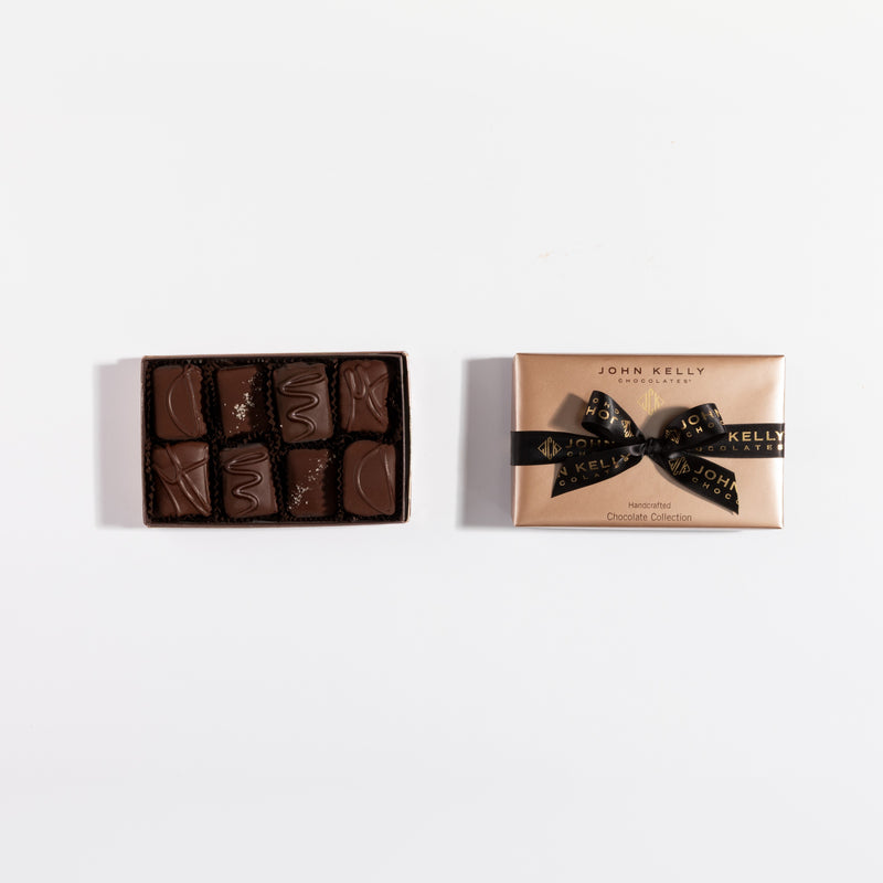 John Kelly Chocolates 8 Piece Signature Handcrafted Dark Chocolate Collection, open box and closed box with black ribbon side by side