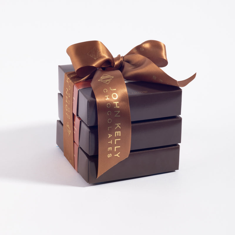 John Kelly Chocolates Truffle Fudge Bites Gift Tower, tied with the John Kelly satin ribbon