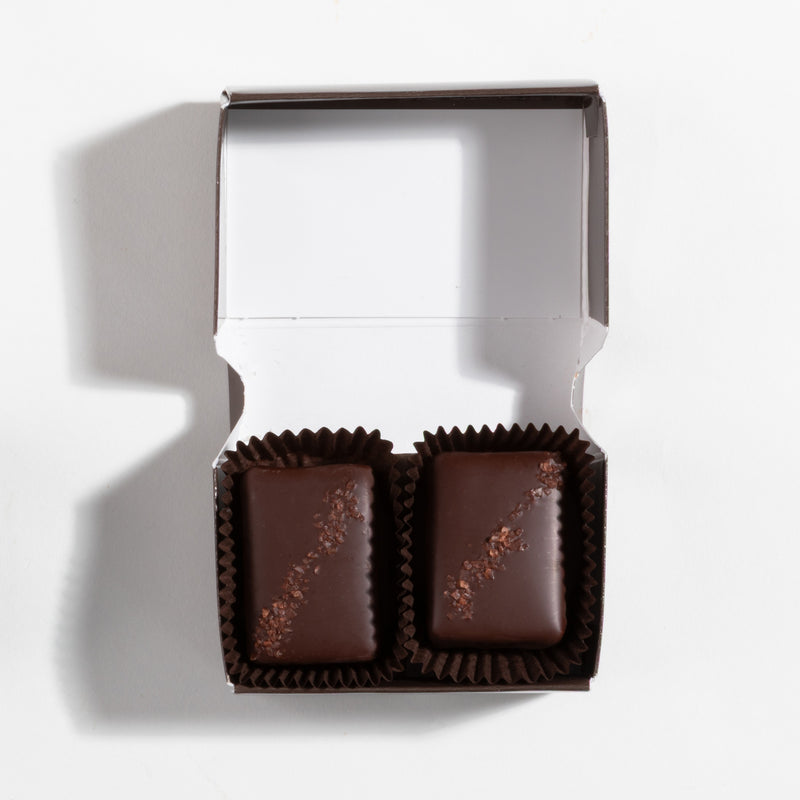 John Kelly Chocolates 2 Piece Semi-Sweet Chocolate & Caramel w/Hawaiian Alaea Sea Salt, open