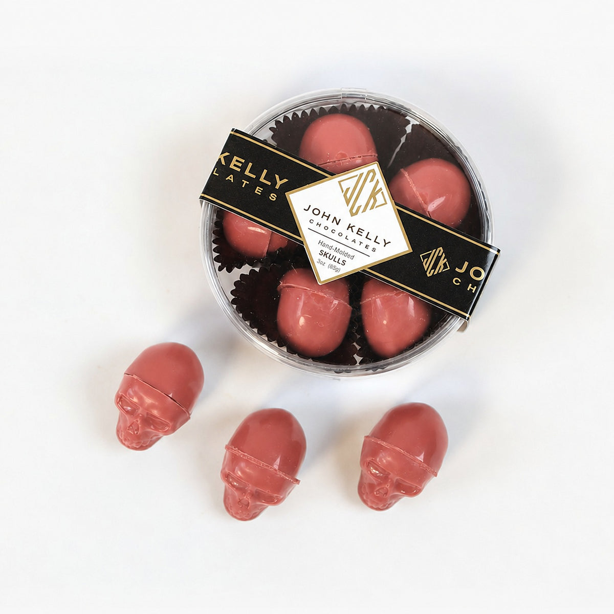 Garnet skulls, boxed with three loose skulls in front
