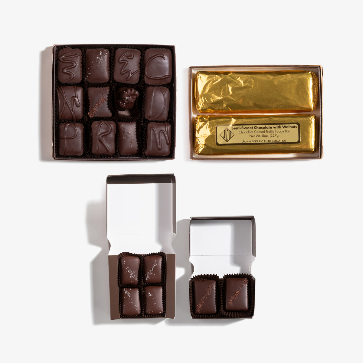 Large Assorted Gift Tower, every box opened: 12pc Signature, 2 Truffle Fudge Bars, 4pc Dark Chocolate with French Grey Sea Salt, 2pc Chocolate & Caramel with Red Hawaiian Alaea Sea Salt