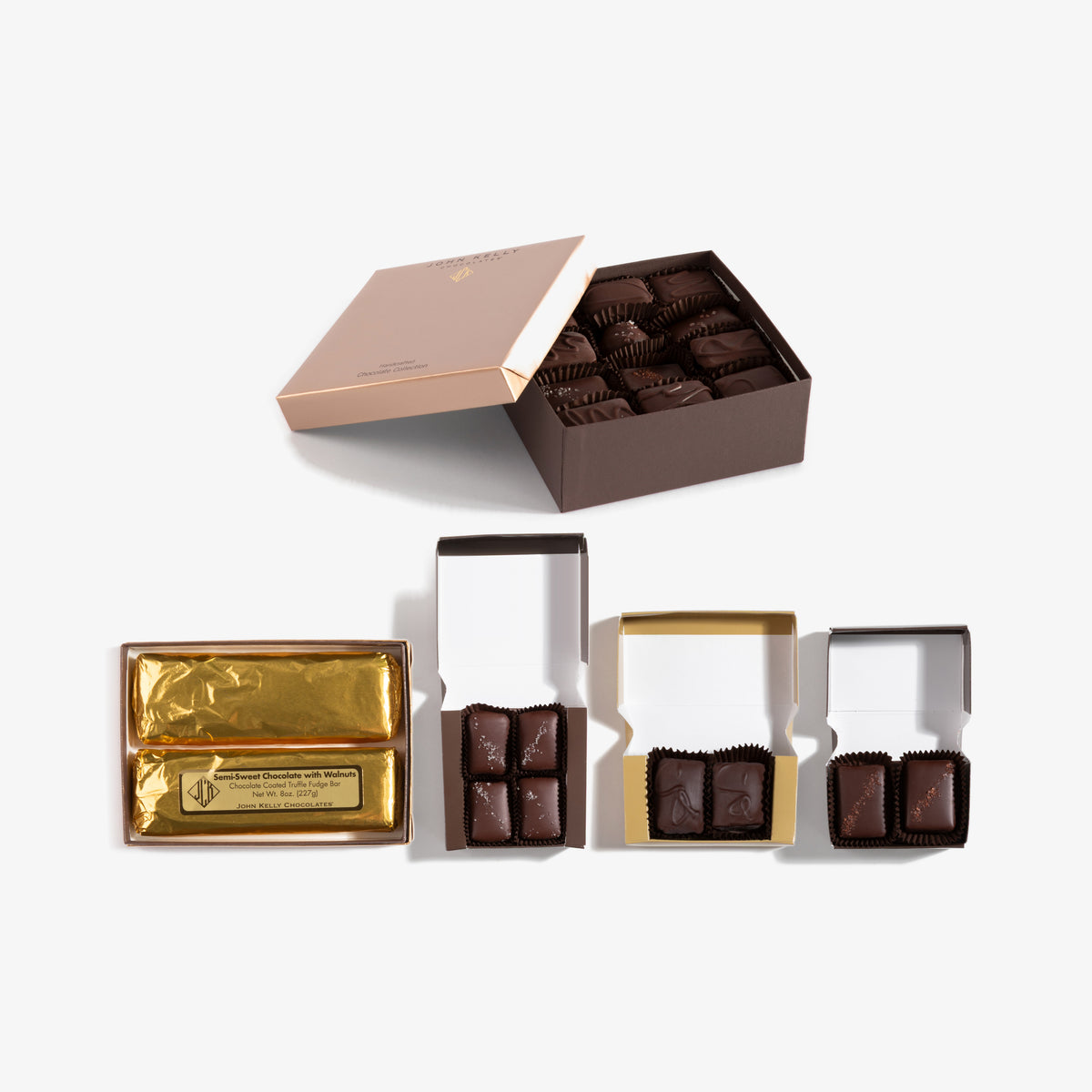 Premier Gift Tower, every box opened: 24pc Signature, 2 Truffle Fudge Bars, 4pc Dark Chocolate with French Grey Sea Salt, 2pc Coconut, 2pc Chocolate & Caramel with Red Hawaiian Alaea Sea Salt