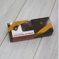 A dark chocolate with walnuts 8oz bar box with a gold ribbon