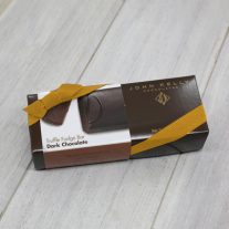 A dark chocolate 8oz bar box with a gold ribbon