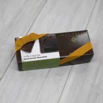 A semi-sweet chocolate 8oz bar box with a gold ribbon